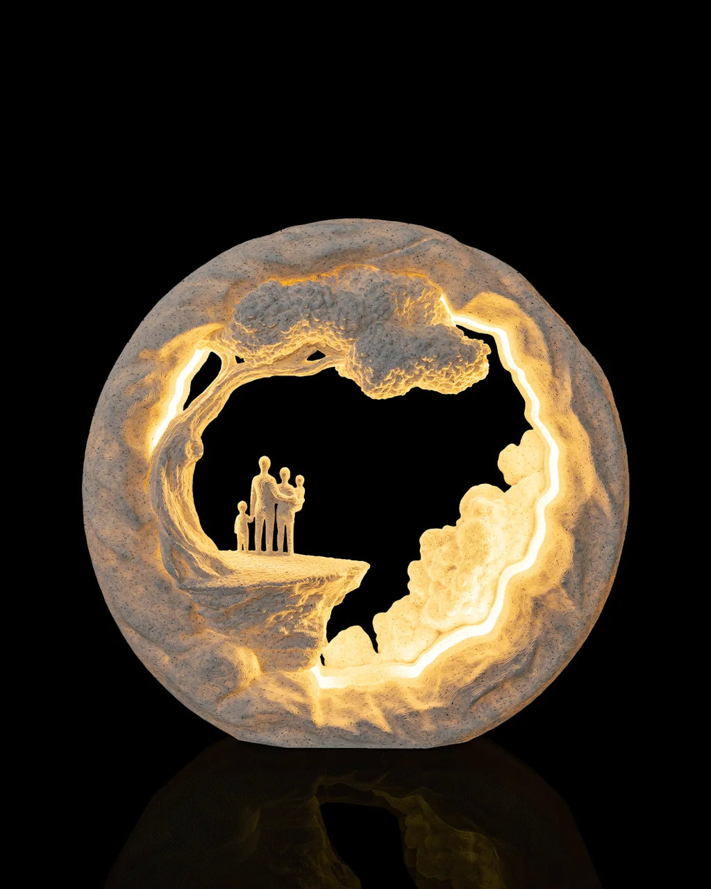 Family Tree Table Lamp illuminated from the front, showing a family gathered beneath a tree