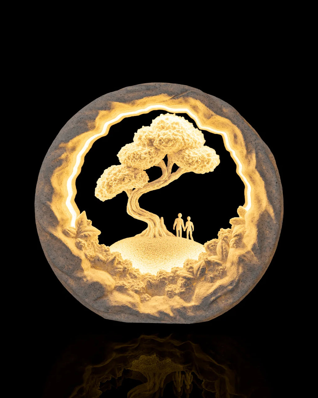 Our Journey Table Lamp illuminated from the front, showing two figures beneath a tree
