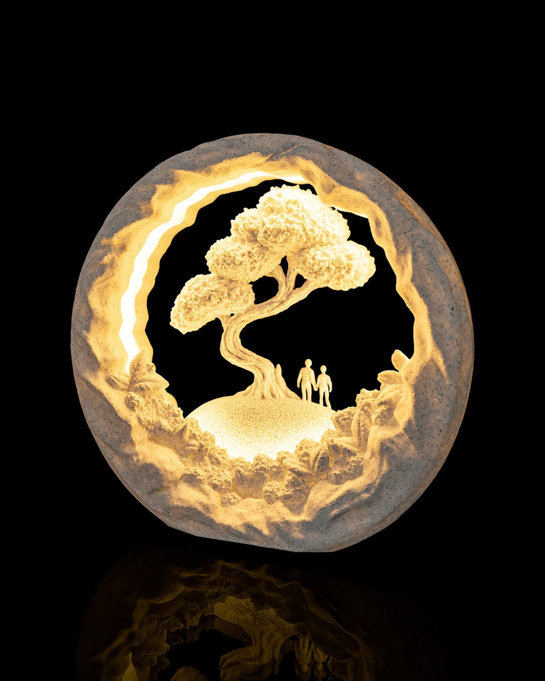 Our Journey Table Lamp illuminated from a left angled view