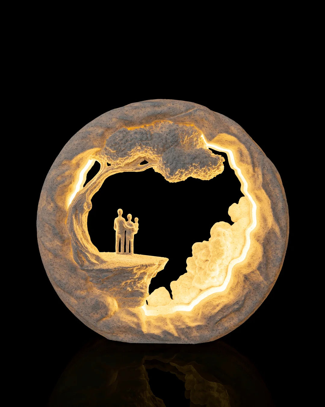 Side by Side Table Lamp illuminated from the front, showing a family beneath a tree
