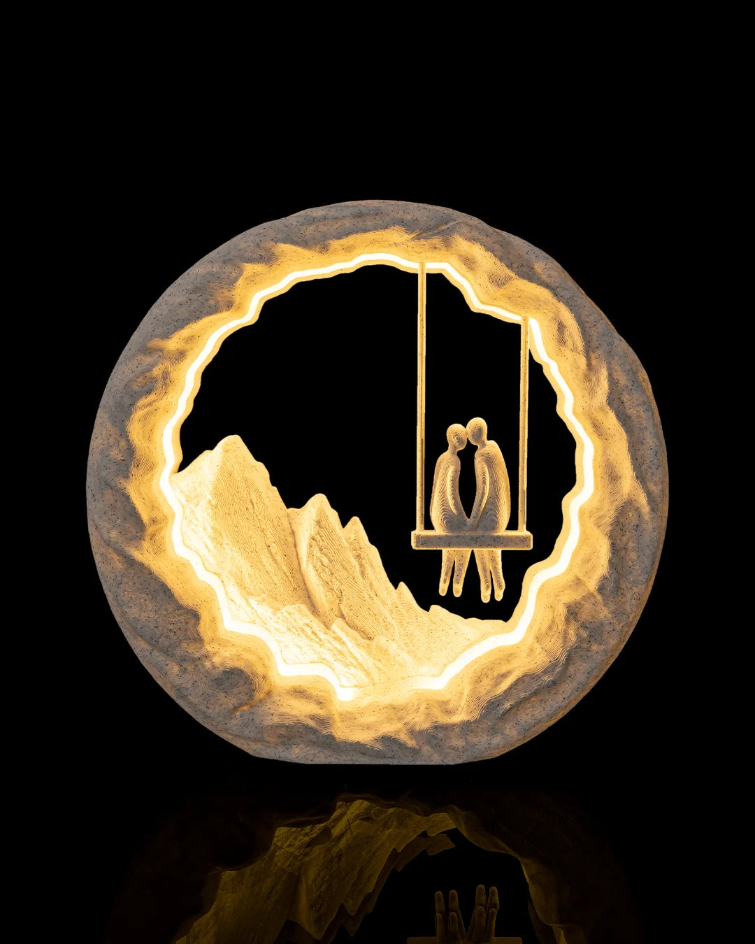 Swing for Two Table Lamp illuminated from the front, showing a couple sharing a swing