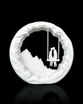 Swing for Two Table Lamp unlit, showing the couple scene and white Marble finish