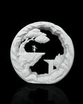 The Dreamer Table Lamp unlit, showing the cliff scene and white Marble finish