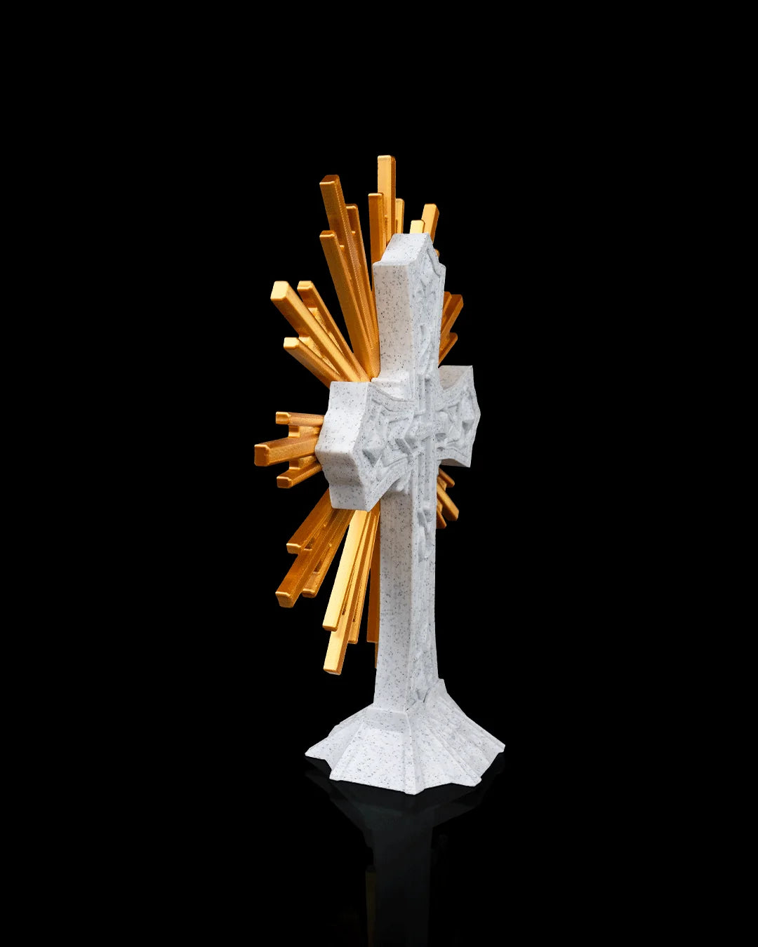 The Sacred Cross decor in marble and gold, angled side view on a black background